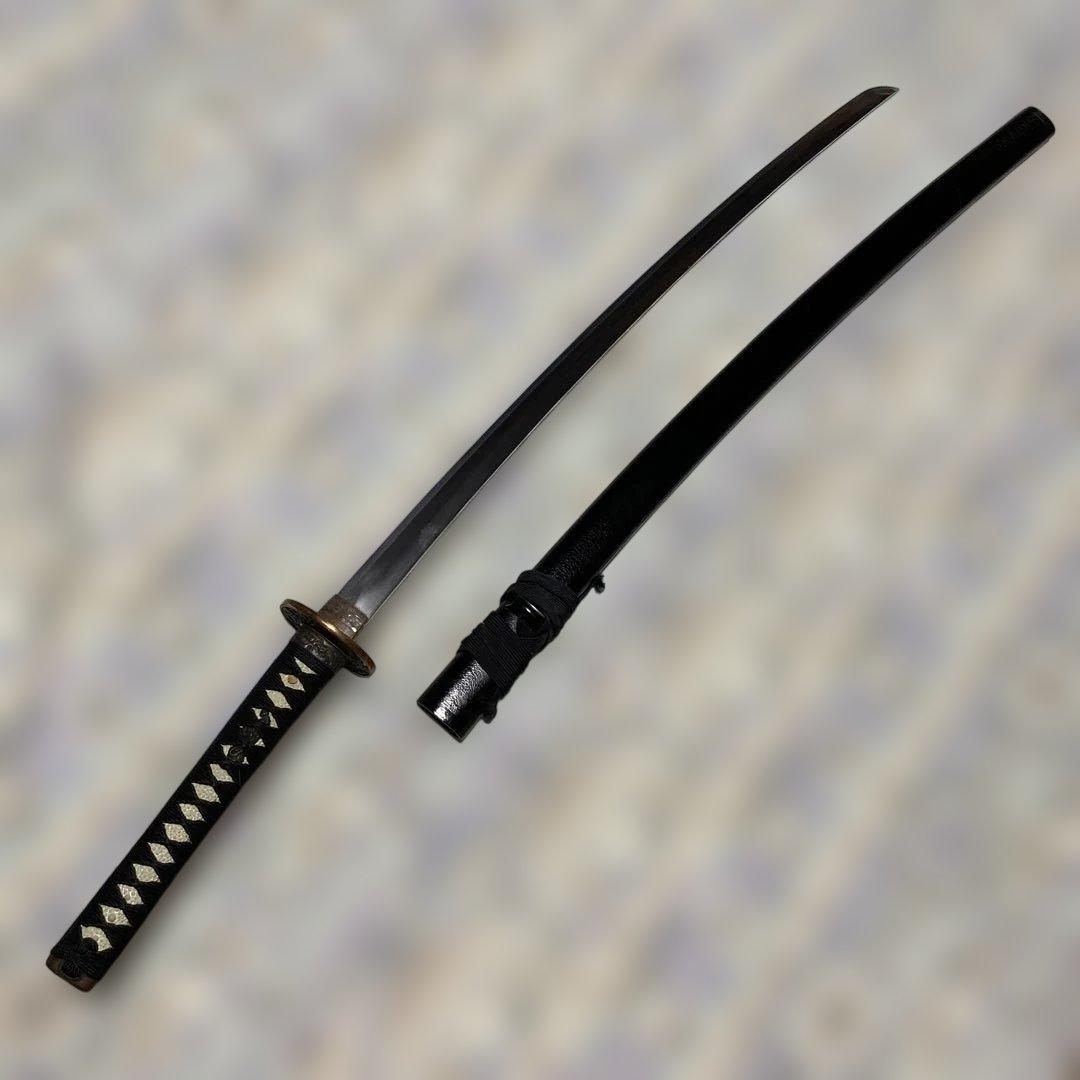 上級模造刀 黒柄 雲龍金縁楕円鍔