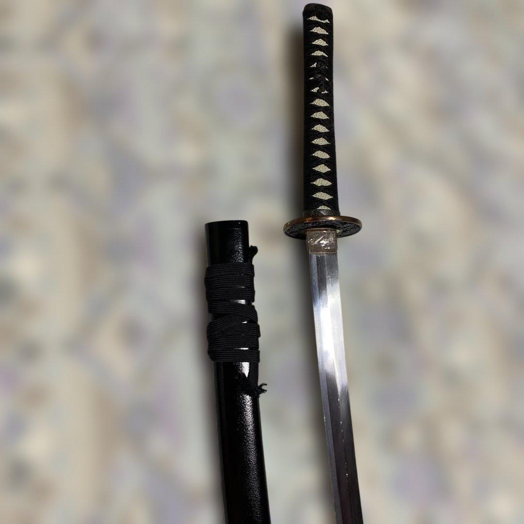 上級模造刀 黒柄 雲龍金縁楕円鍔