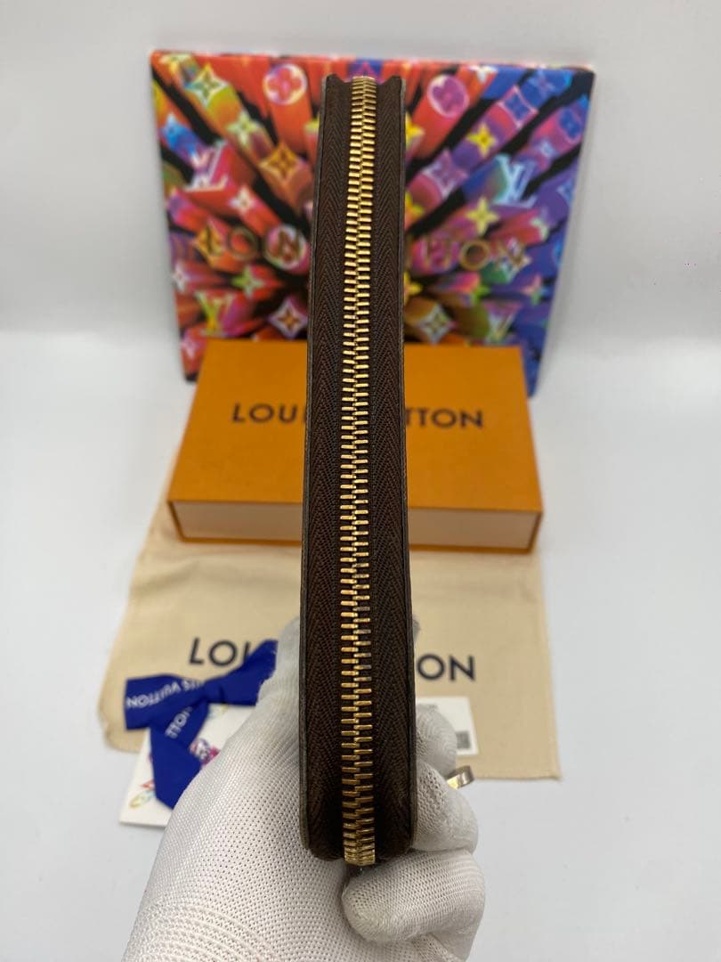 ルイヴィトン モノグラム ジッピーウォレット 長財布 ブラウンMI2173