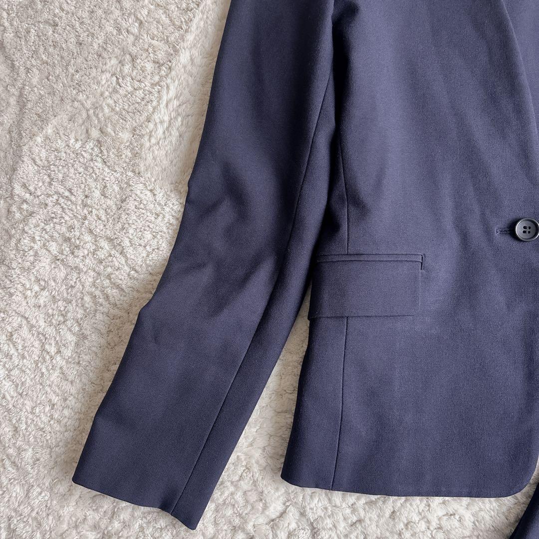 プラステ ノーカラーパンツスーツ ブラッシュドバック S/XS ネイビー