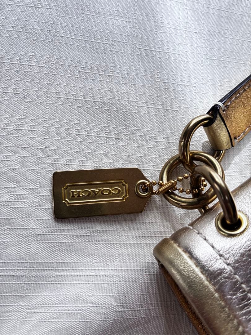 バッグ Coach legacy stripe turn lock llic