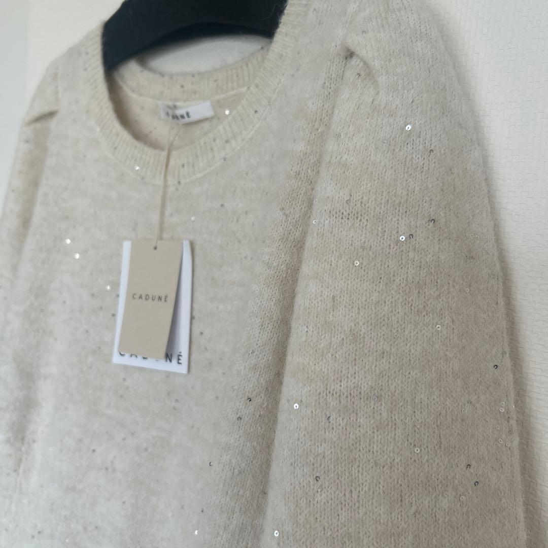CADUNE キラキラペプラムニット