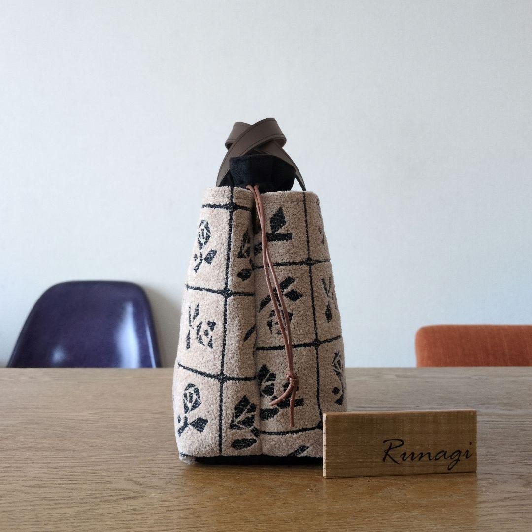 【1551】あおりポケットの巾着バッグ＊ミナペルホネン