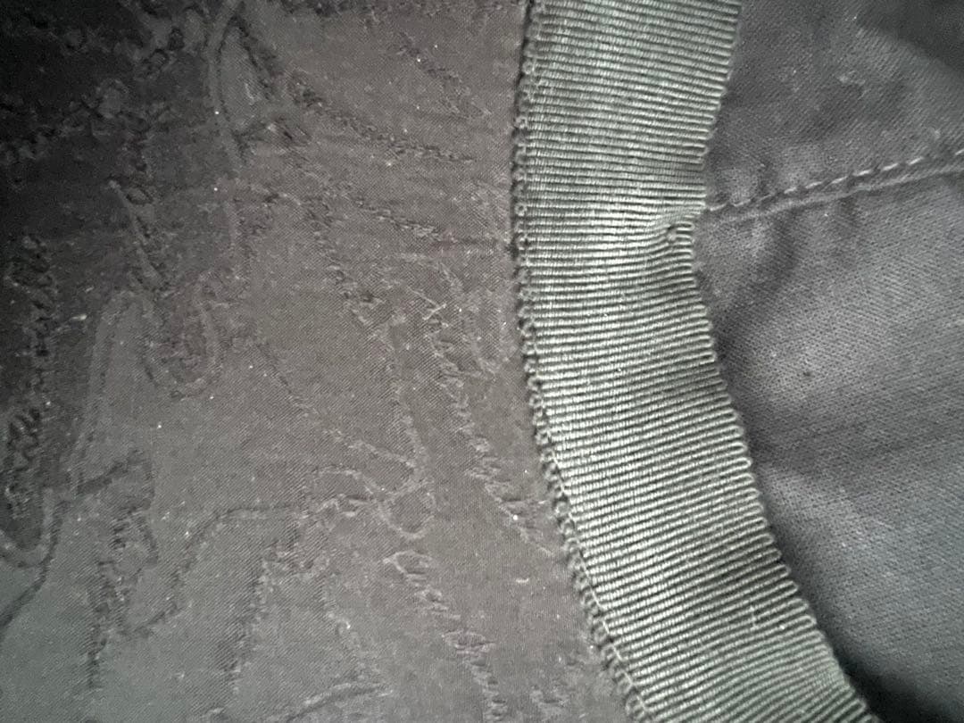 シャネル 黒 エンボスキャップ