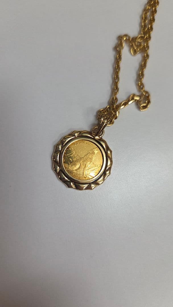 純金ペンダントトップ k24 24金 純金 1/25oz 18金枠 k18