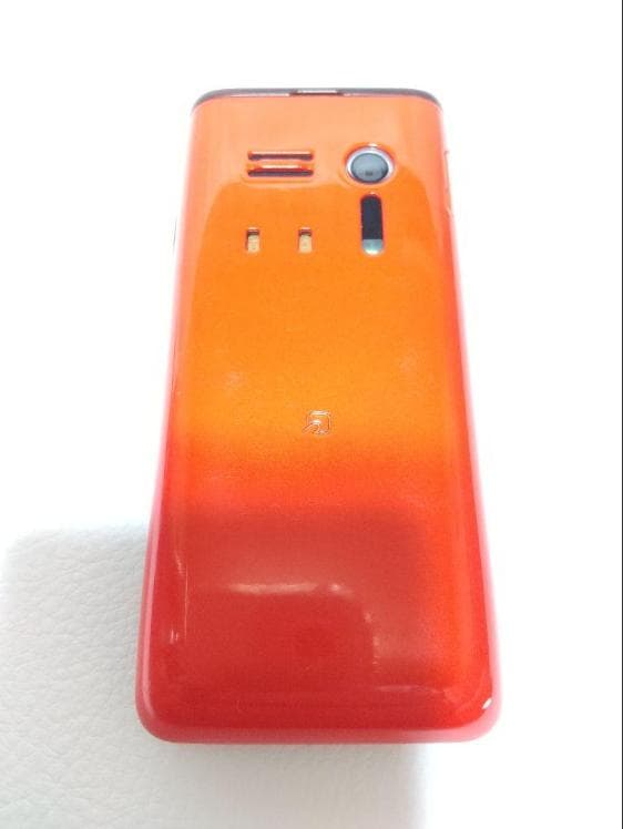 GRATINA KYY06 折りたたみ式携帯電話 オレンジ