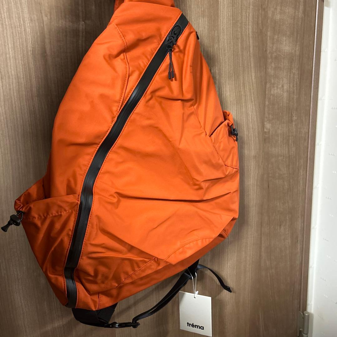 バッグ trema STRING SLING BAG orange