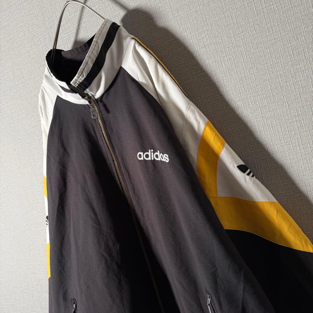 90s★adidas 万国旗タグ ナイロンジャケット 刺繍 アームロゴ L程度