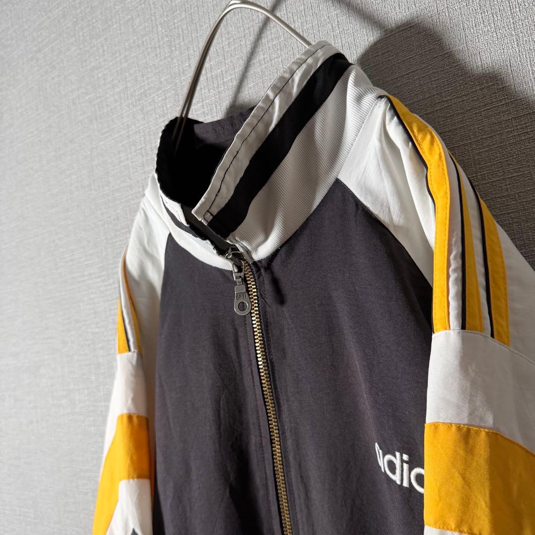 90s★adidas 万国旗タグ ナイロンジャケット 刺繍 アームロゴ L程度