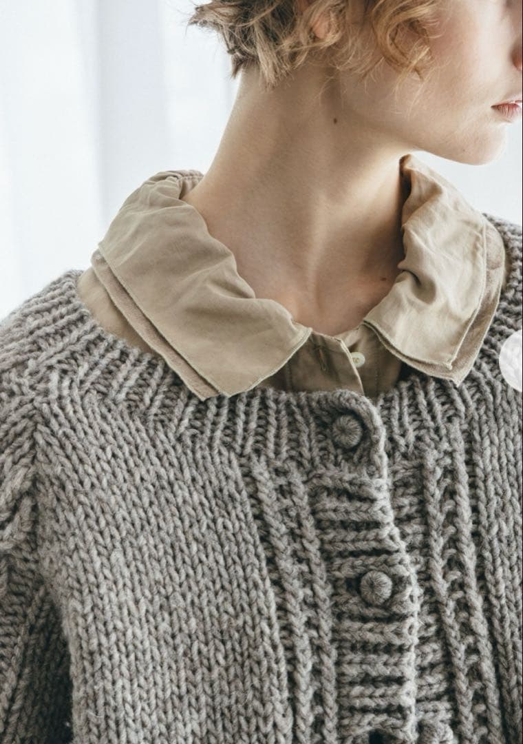 naoko。今季 ネストローブ ペルーケーブルスリーブニットカーディガン