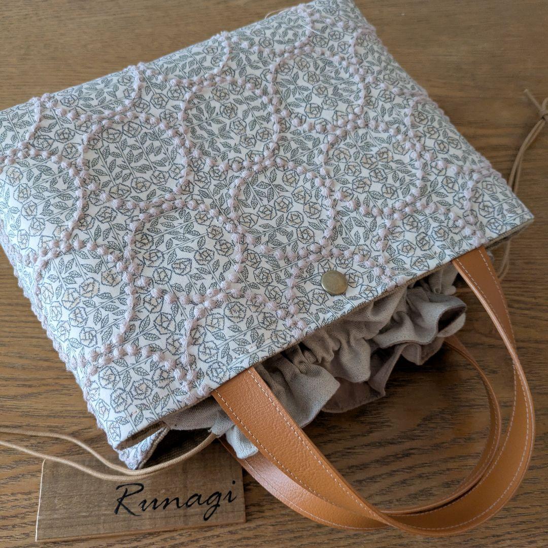 【1548】あおりポケットの巾着バッグ＊ミナペルホネン