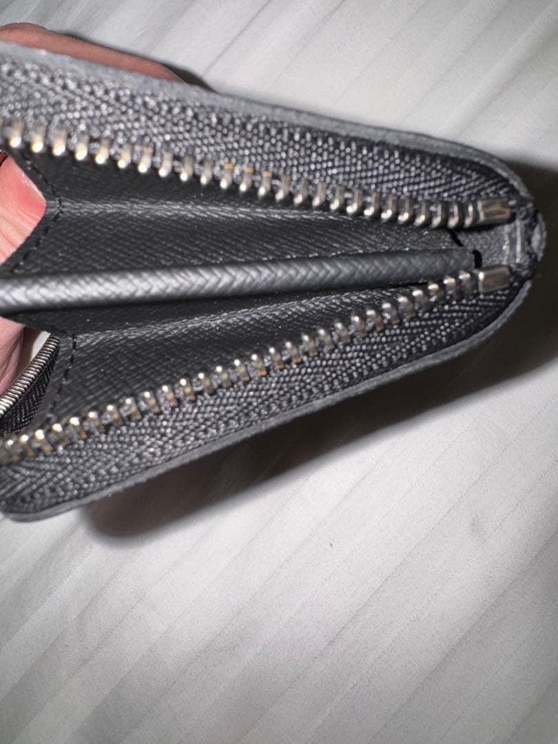 ルイヴィトン ジッピー・パースヴェルティカルM81662