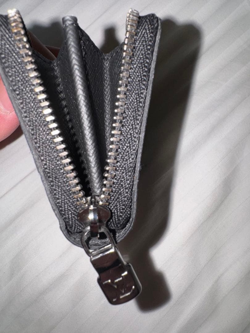 ルイヴィトン ジッピー・パースヴェルティカルM81662